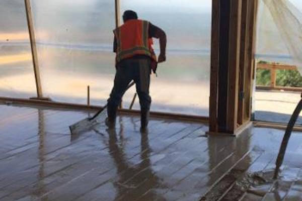 Gypsum being installed over radiant heating 